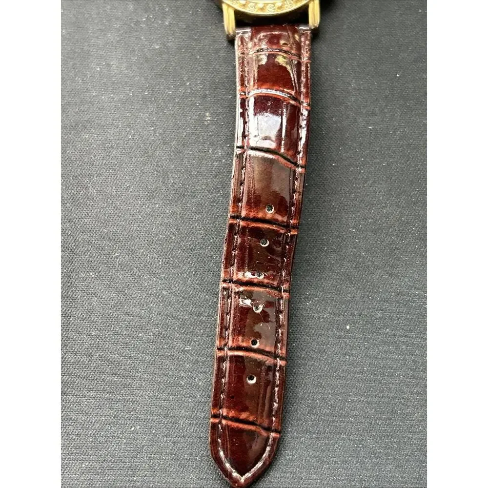 Gold Tone Pearlized Dial Women’s Quartz Watch